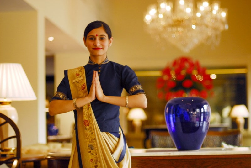 nepali women welcoming guest with namaste